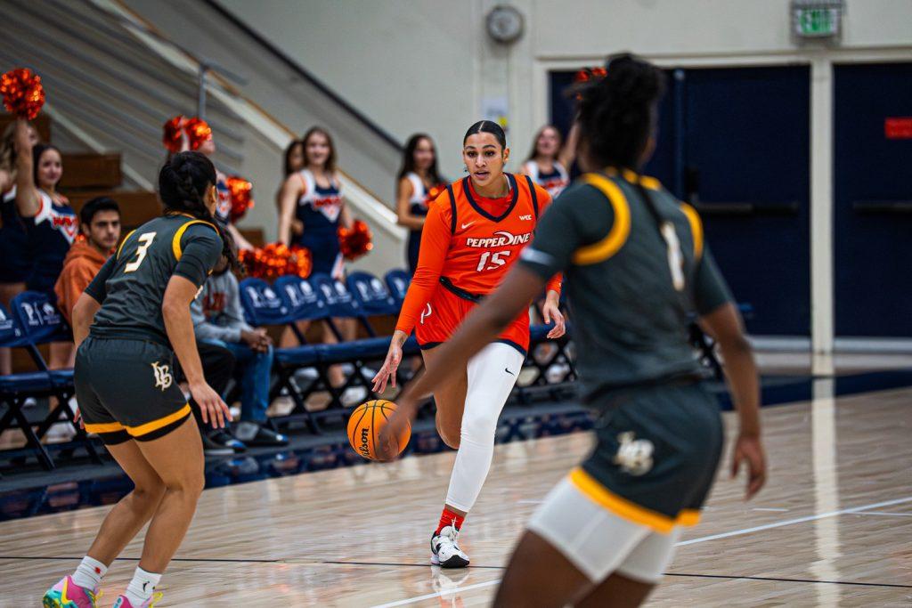Graduate starting guard, Myra Gordon, drives down the court against Long Beach State on Nov. 27 night in Firestone Fieldhouse. Gordon collected nine rebounds for the Waves, a game-high statistic. Photos courtesy of Pepperdine Athletics