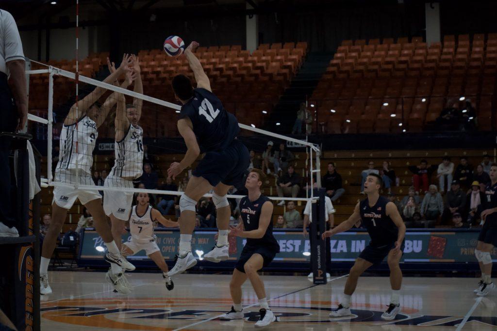 Freshman outside hitter Ilay Haver goes for a kill in a match against Lincoln Memorial on Jan. 14, at Firestone Fieldhouse. Pepperdine swept Lincoln Memorial 3-0. Photos by Liam Zieg