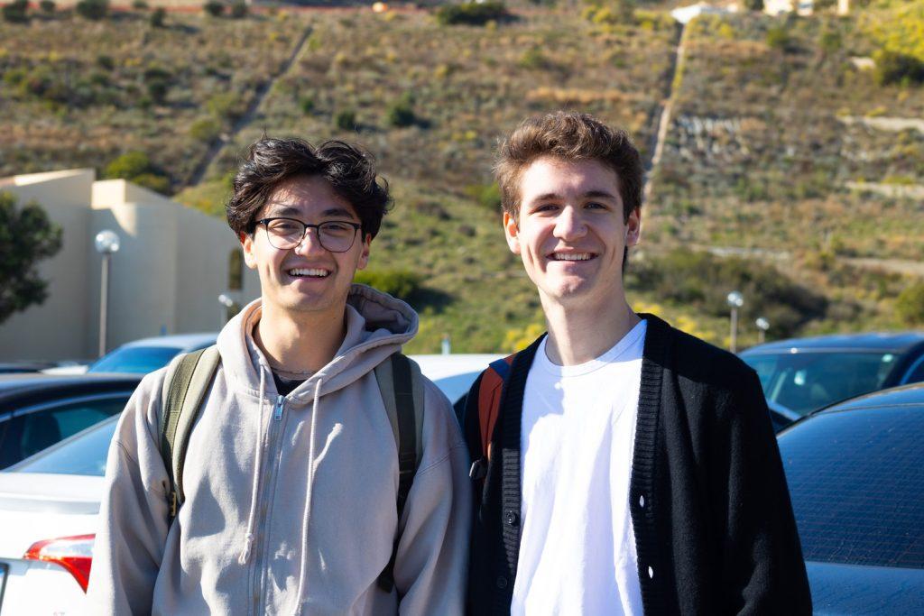 Alexander Paloglou (left) and Owen Mirka (right) pose in the Rho parking lot on Jan. 10. They said the closure of Rho will be worth it in the long term.