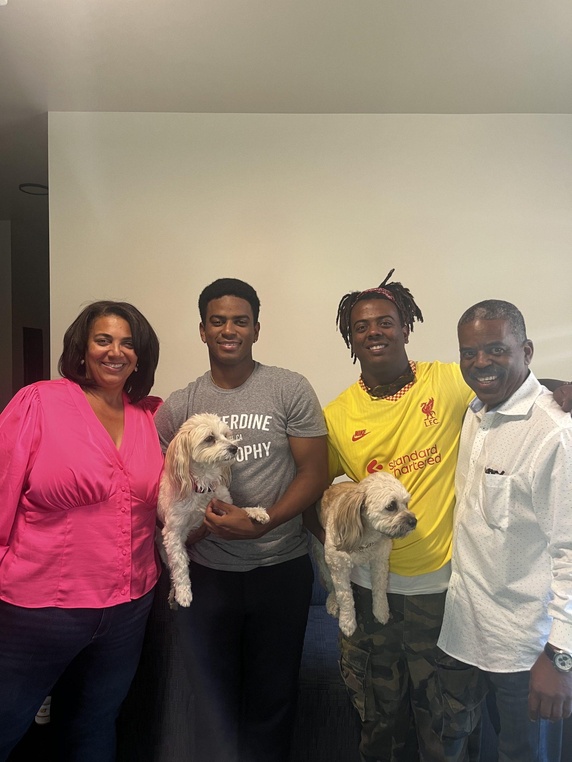 Nathan Thomas (second from the left) with his family and pets, taken at Seaside Residence Hall in Nov. 2023. Thomas said one of the benefits of living close to home is the ability to see his family more frequently. Photo courtesy of Nathan Thomas