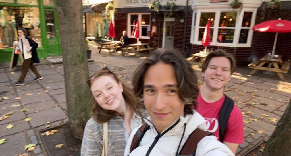 Spare visited a pub in Richmond and many other sites in the show with friends Graphic Senior Reporter Ava Heinert (left) and Lucas Borrilez (middle) in November 2022. Photo courtesy of Charlie Spare