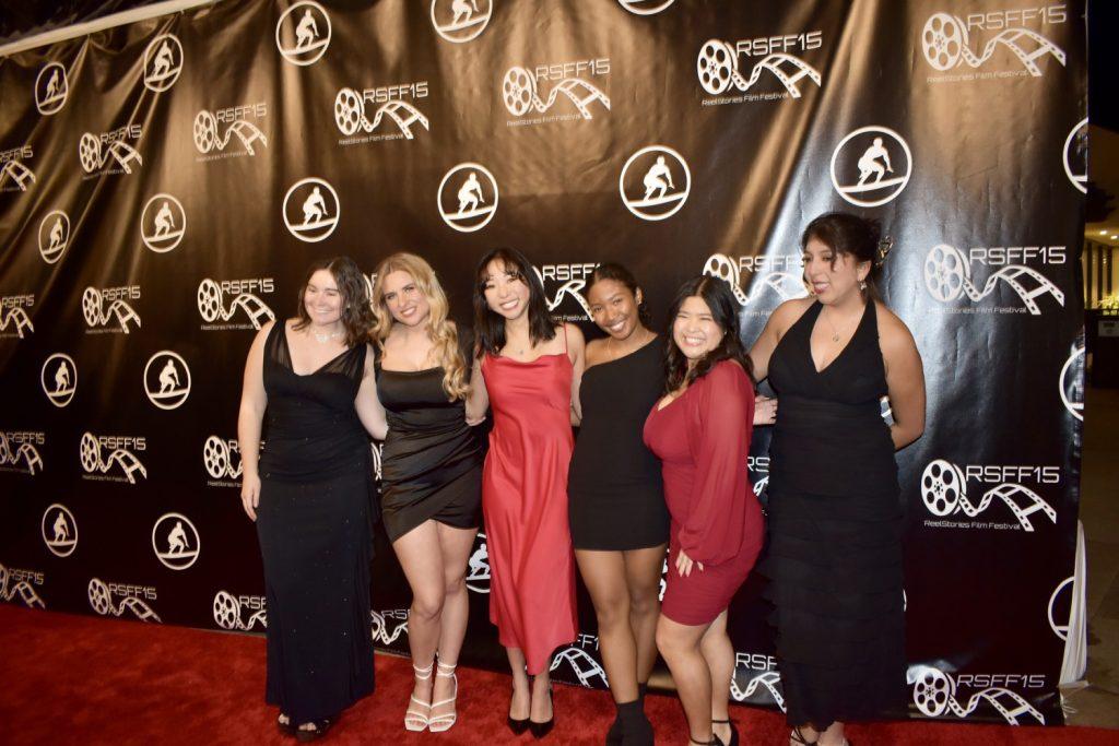 (From left to right) Sofia Thure, Annika Huckeba, Megan Elias, Sydney Jean-Simon, Kala&squot;i Kia&squot;aina and Carly Rodriguez of the film "Hidden Joy" pose for a photo on the red carpet in Lower Mullin Town Square before the viewing begins Feb. 9. Thure and Rodriguez said the crew filmed all the scenes in only one day.