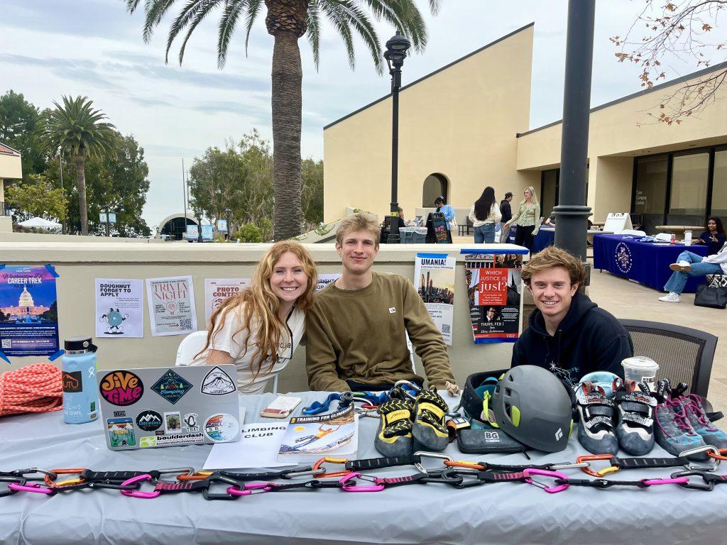 Pepperdine Climbing Club executive board poses with climbing gear and club table on Mullin Town Square on Jan. 23. They were promoting the community and benefits of Climbing Club at Tidepools.