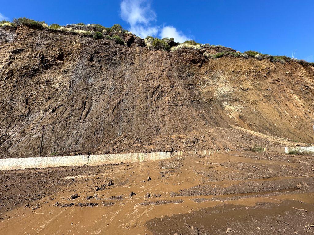 Mud and rocks cover all lanes of PCH between Latigo Canyon and Corral Canyon. The rocks on the hillside remain unstable, Horton said. Photo courtesy of Tim Horton