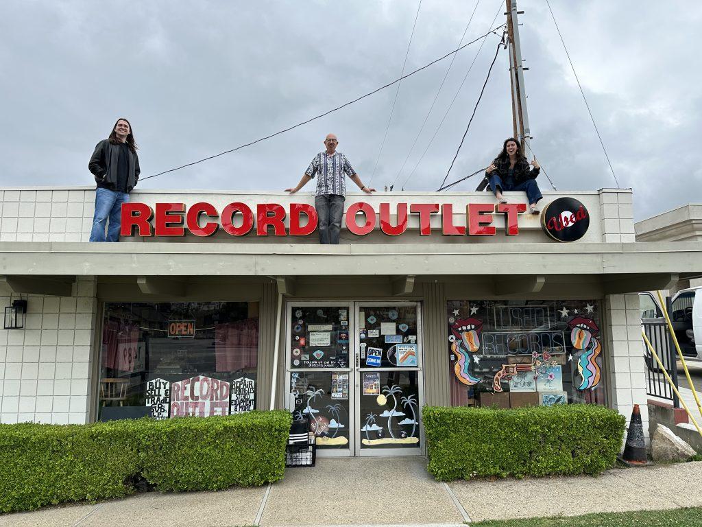Senior Bob Emrich (left) poses on the roof of the Record Outlet with his coworkers in Thousand Oaks on June 19. Emrich said the staff was celebrating the store's 27th anniversary. Photo courtesy of Bob Emrich