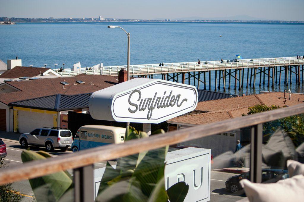 The sign of Surfrider Hotel rests just above Pacific Coast Highways and the Malibu Pier on Feb. 11. This boutique hotel has been conveniently located next to important Central Malibu restaurants, beaches and shops since 1953 according to their website.