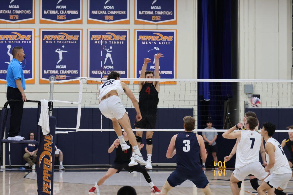 Graduate Student Alex Mrkalj takes a shot at the USC squad March 15 at Firestone Fieldhouse. Mrkalj had 10 kills over the course of the game.