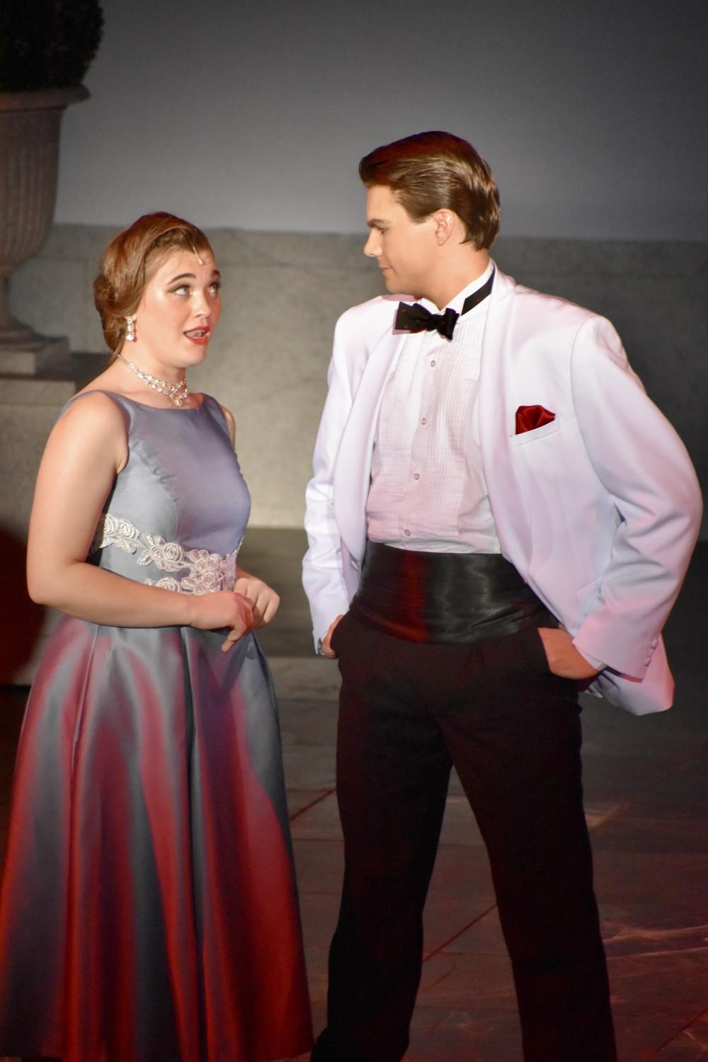 Hannah Glawari, played by Ballinger (left), and Count Danilo Danilovitsch, played by Joshua Corey, stubbornly refuse to acknowledge their love for one another Feb. 24, in Smothers Theatre. Danilo and Hannah were engaged long ago but broke off their engagement because of familial pressures and class differences.