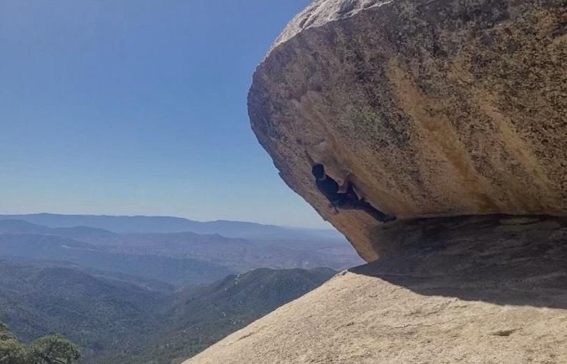 Climbing Club President Elijah Ettedgui climbs at Black Mountain. The climb is called "Once Upon a Time."