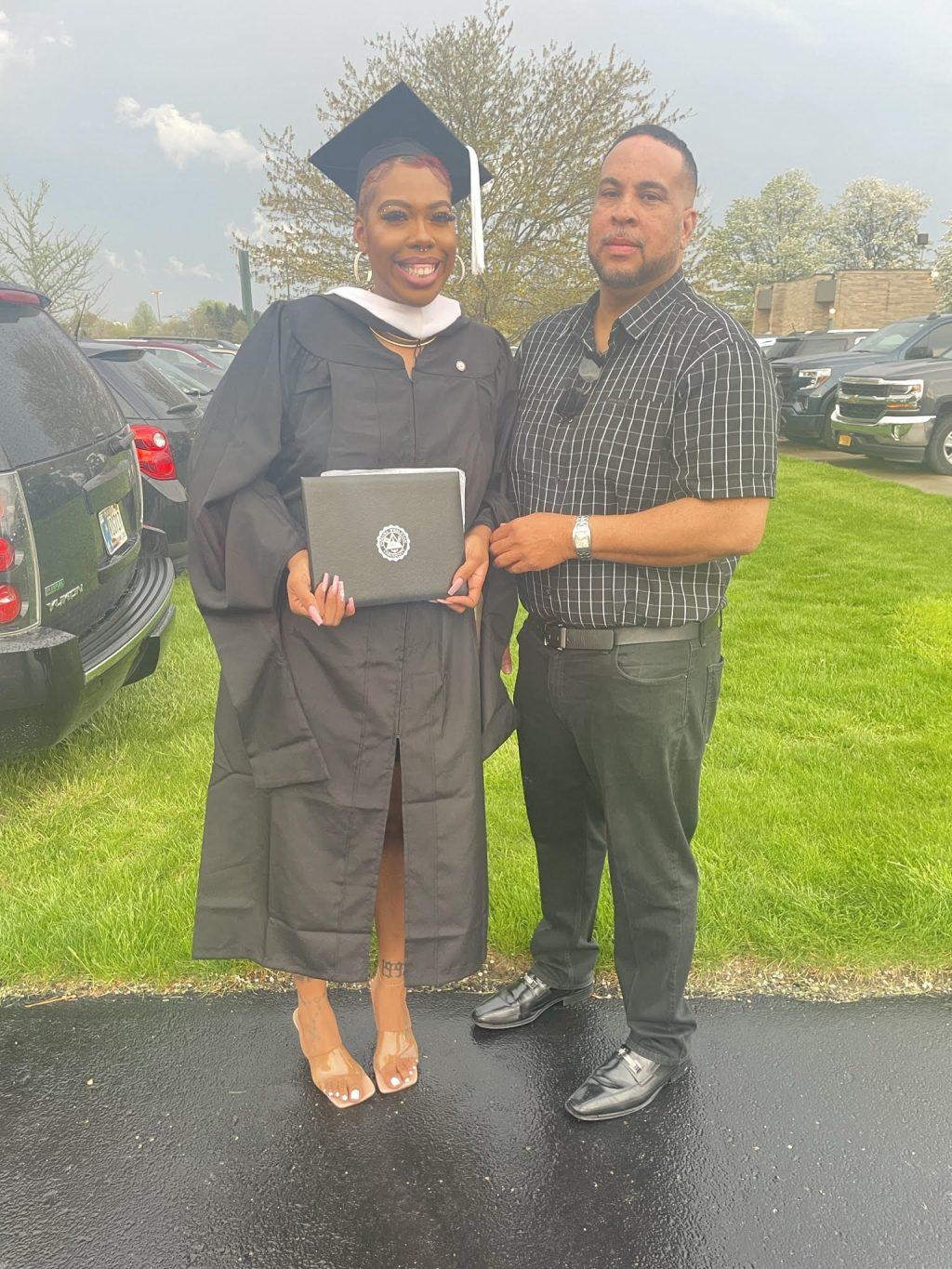 Shelbi Chandler stands with her father on the day of her graduation at Indiana Wesleyan University on April 30, 2022. Chandler said her father demonstrated the importance of resistance. Photo courtesy of Shelbi Chandler