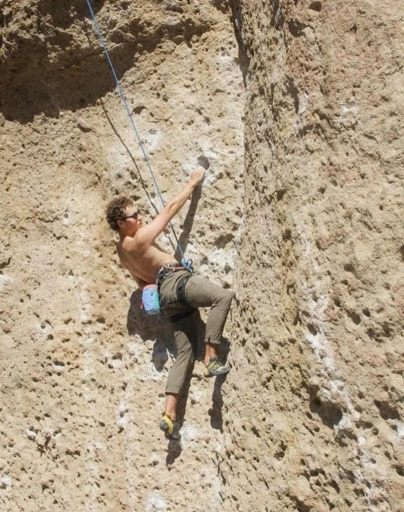 William Hibbard, Climbing Club&squot;s treasurer and gear and safety officer, climbs the "Planet of the Apes Wall" in Malibu Creek during the 2023 fall semester. He said climbing is one of his greatest passions. Photo courtesy of Elijah Ettedgui