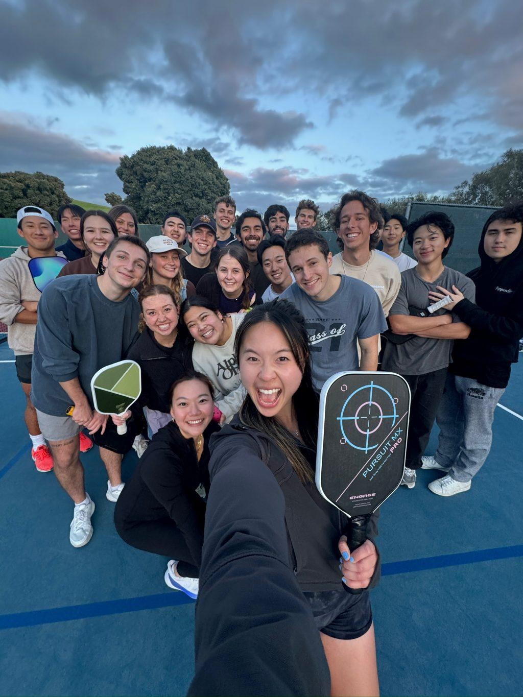Hsu takes a 0.5 selfie with members of Pepp Pickle during an open play session Feb. 9, at Lower Alumni Courts. It is a Pepp Pickle tradition to take 0.5 selfies together after open plays, Hsu said. Photo courtesy of Katelyn Hsu