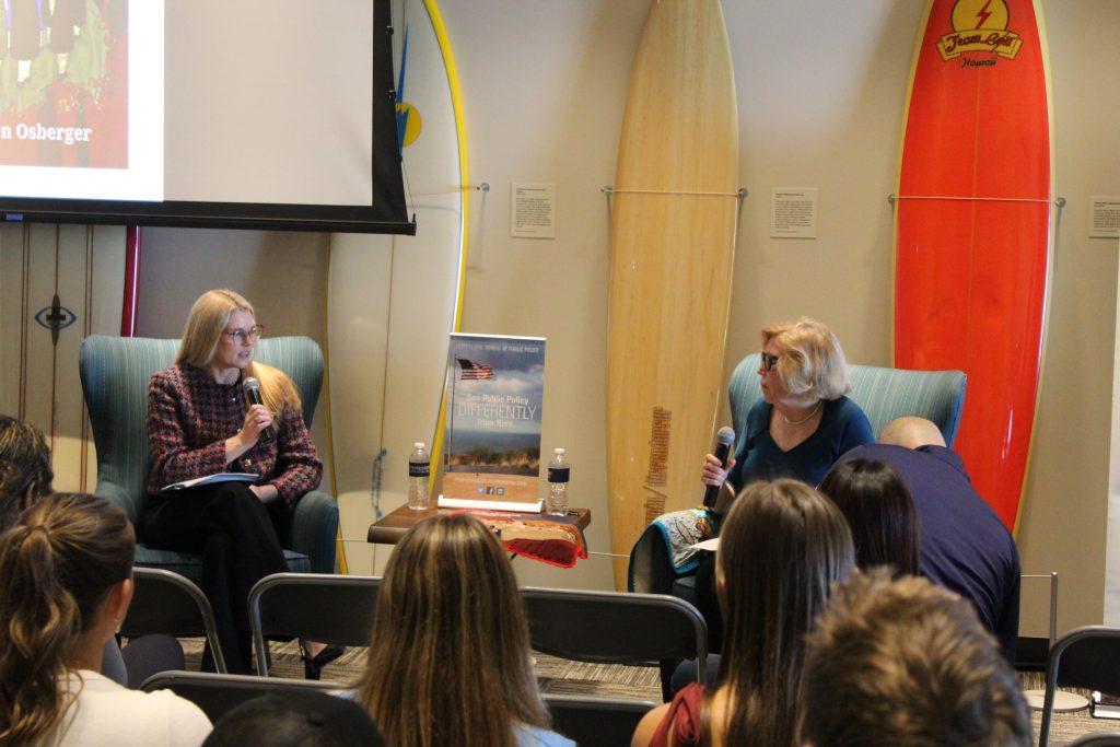 Lila McDowell Carlsen, interim vice provost and professor of Hispanic studies, and Kathleen Osberger discuss Chile in the 1970s in Payson Library's Surfboard Room on March 5. Osberger was a 22-year-old teacher sheltering political dissidents following the 1973 CIA-assisted coup invasion of Chile.