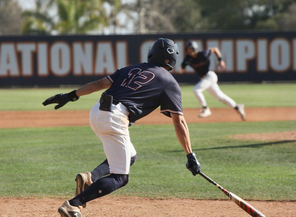 Renck drives a singles through the infield, scoring two runs for the Waves against Pacific on March 22. Renck went 3-5 at the plate, stole a bag and drove in two.