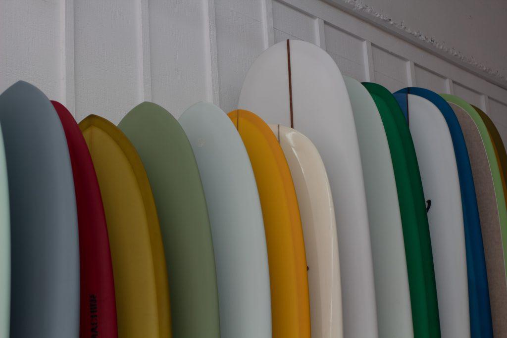 Sea N' Soul offers surfboards for sale in a variety of colors, shapes and sizes March 31. Sea N' Soul worker Layla Polito said she met Liakos while volunteering at a surf camp with her in the summer of 2021.