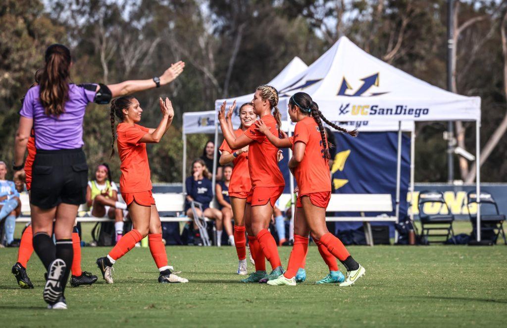 Verplancke celebrates with her teammates after scoring the sole, game-winning, goal of the match. This was Verplancke's first collegiate goal of her young career.