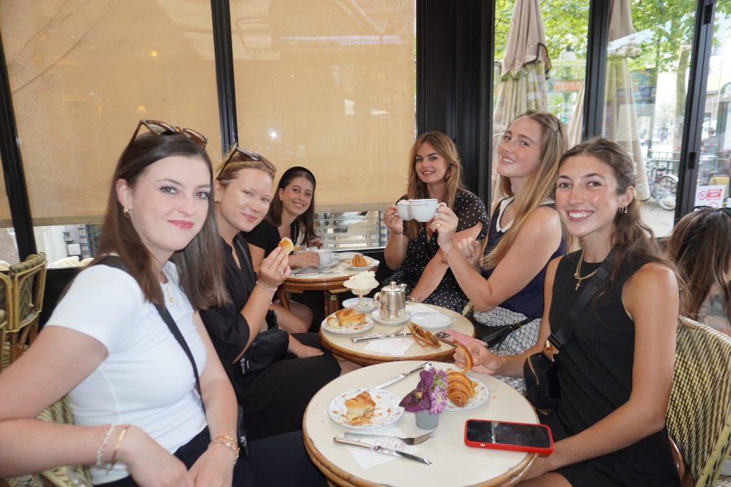 (From Left to Right) Kennedy Duke, Cam Dueck, Milena D'Andrea, Digital Editor and Social Media Producer, Emily Garrison, Kelsey Ramsey and Marla Steel pose for a photo at Carette Paris on July 19. The students arrived in Paris on July 16 and had 10 days of freedom before the Olympics officially started on July 26. Photo courtesy of the Paris program