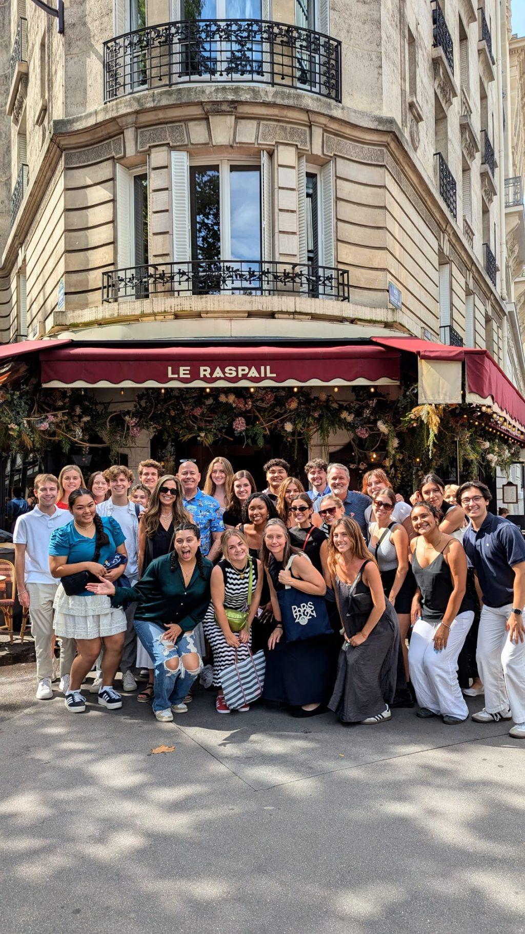 The Paris program students in front of the Le Raspail Cafe on July 31. The group met with a company called RPA, a full-service American advertising and marketing agency company. Photo courtesy of the Paris program