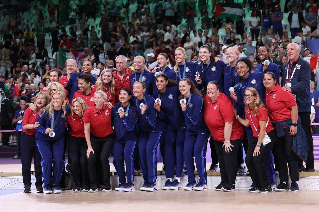 Dunphy and Team USA holding up their silver medals after suffering a loss to Italy. Dunphy made his ninth appearance at the Olympic Games, securing his seventh Olympic Medal finish. Photo courtesy of Pepperdine Athletics