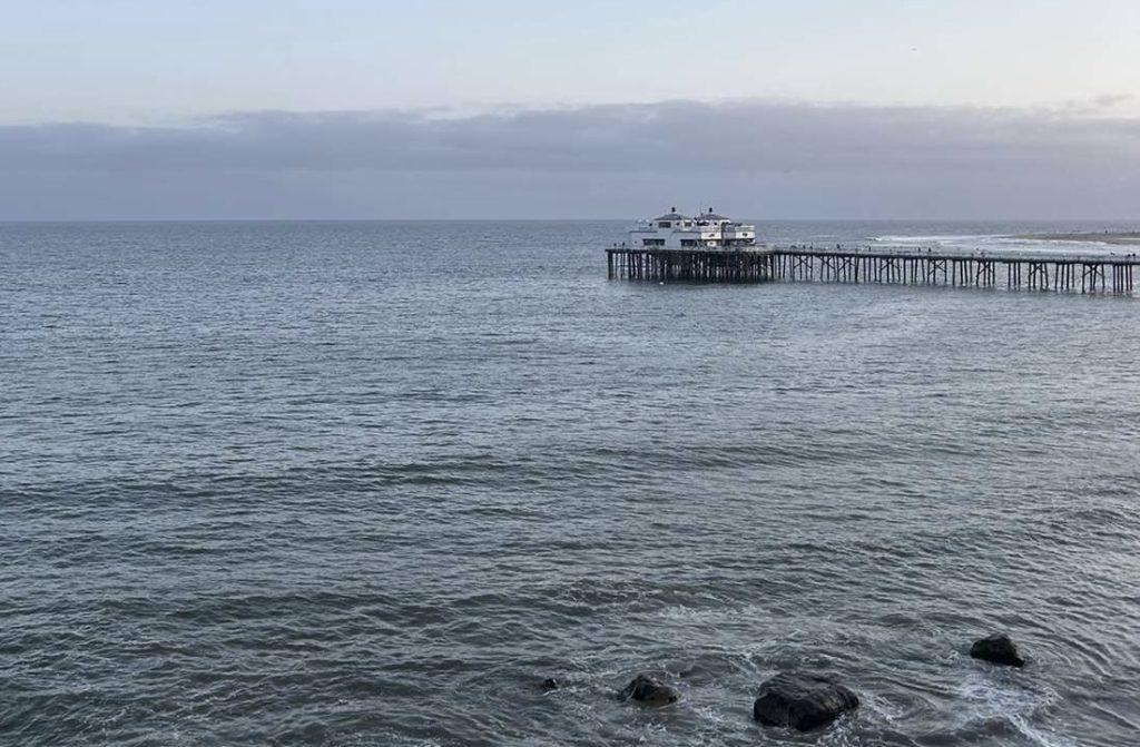 Students admire the Malibu Pier during sunset hours in May. Junior Emilia Schirrmeister said she celebrated her birthday with friends at the Malibu Inn on an ocean view terrace. Photo courtesy of Emilia Schirrmeister