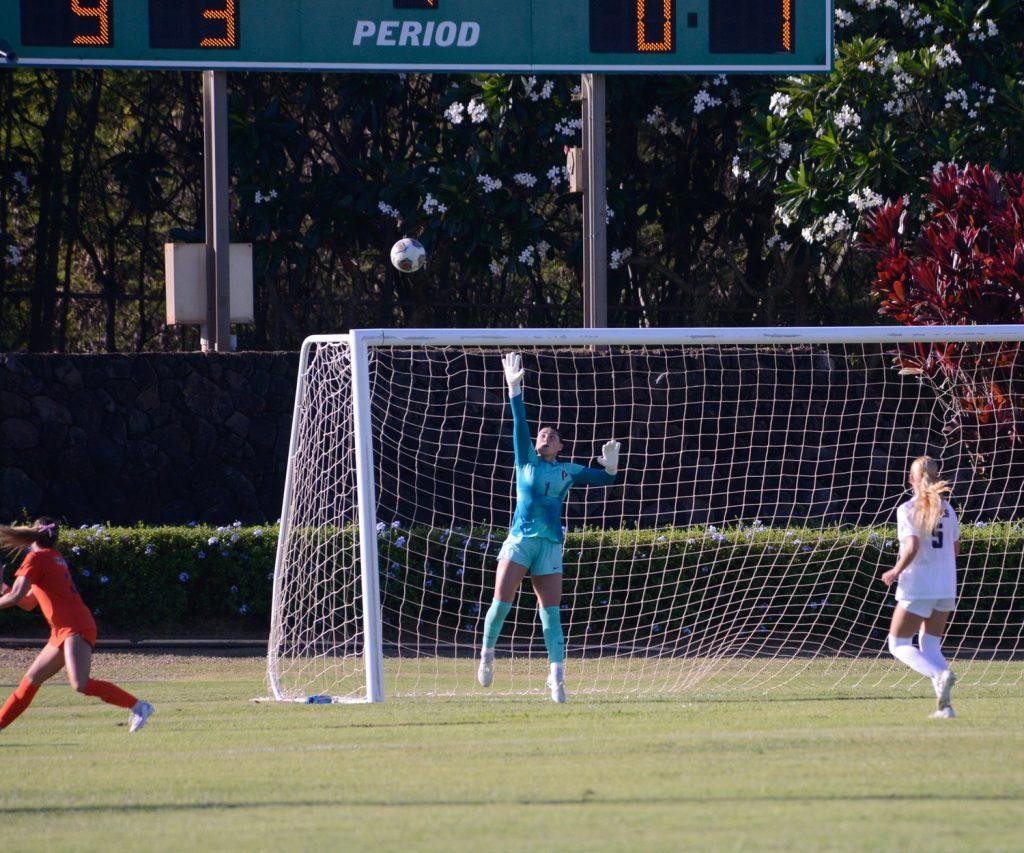 Redshirt junior goalkeeper Taylor Rath jumps up for the save against Utah State at the Waipi'o Peninsula Soccer Complex on Aug. 15. Rath played 45:00 minutes, saving one shot on goal while allowing two.