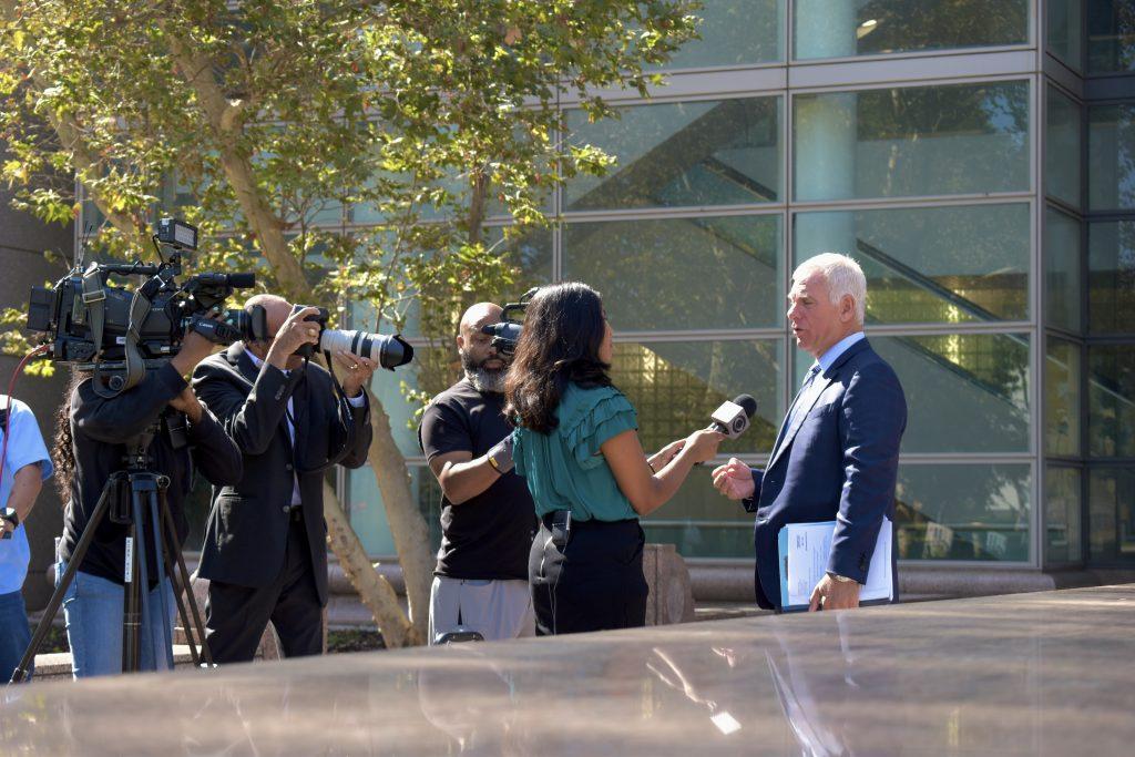 Defense attorney Michael Kraut speaks to reporters outside of the Van Nuys Courthouse on Aug. 28. A preliminary trial date is set for Oct. 9 at the Van Nuys Courthouse West.