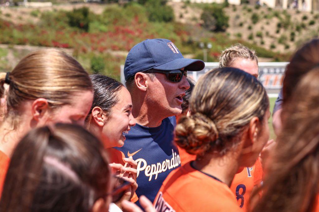 Head Coach Tim Ward speaks to his team after a top ten win Sept. 1 at Tari Frahm Rokus Field. The win over No. 3 UCLA is his 300th career win which have all been in his time as a Wave.