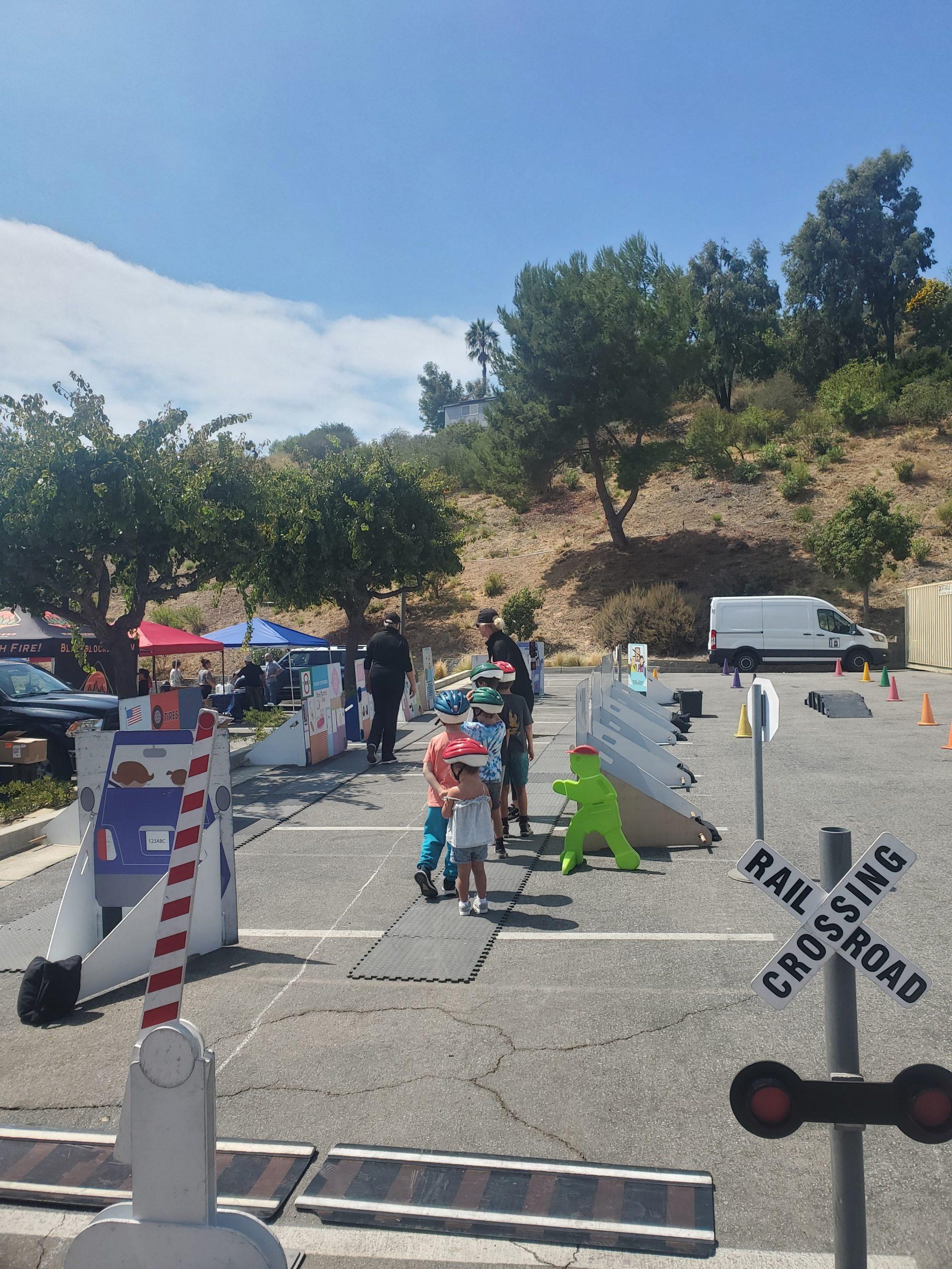 Kids learning how to be safe near a road at the Safety and Preparedness Fair at Malibu City Hall on Sept. 15. Kids were able to meet law enforcement and learn how to be safe in their communities.