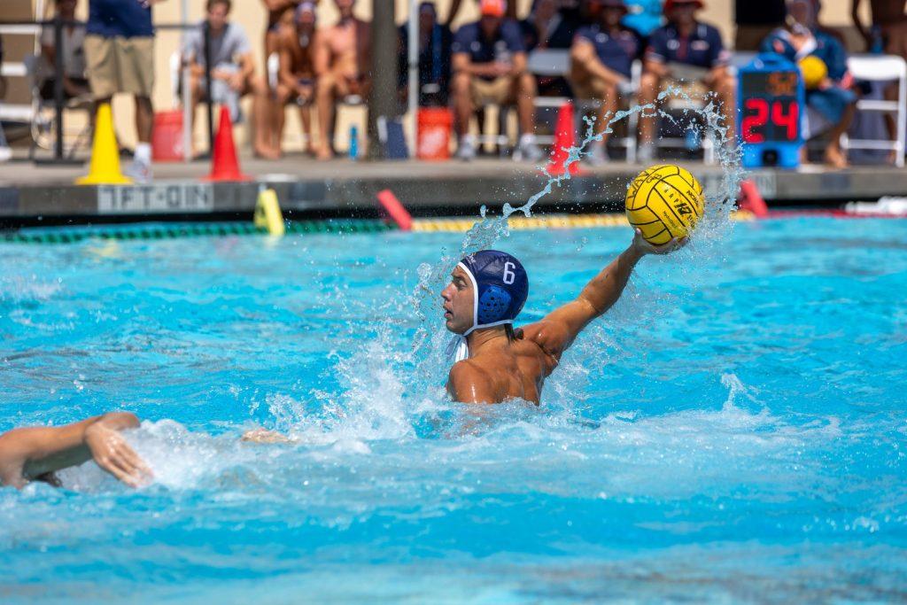 Senior attacker Clay Kaneko readies the ball on Sept. 19 at Raleigh Runnels Memorial Pool. Kaneko ended the game with an assist, bringing his season total to three.