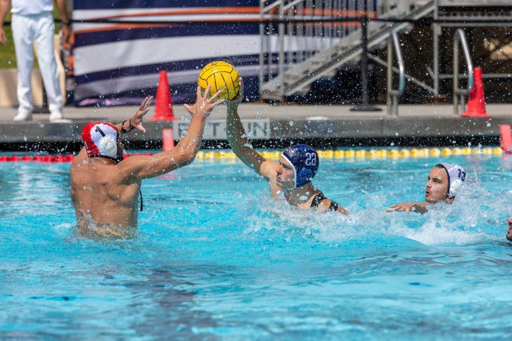 Westcliff contests freshman attacker Erik Ionescu on Sept. 19 at Raleigh Runnels Memorial Pool. Ionescu finished the match with one goal and one assist.