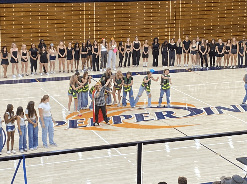 Students at Pauley, Banowsky, White and Drescher Towers houses recount the story of former Pepperdine president who founded the Heidelberg International Program, Aug. 17 at Firestone Fieldhouse. M. Norvel Young's appointment as new Pepperdine president is performed.