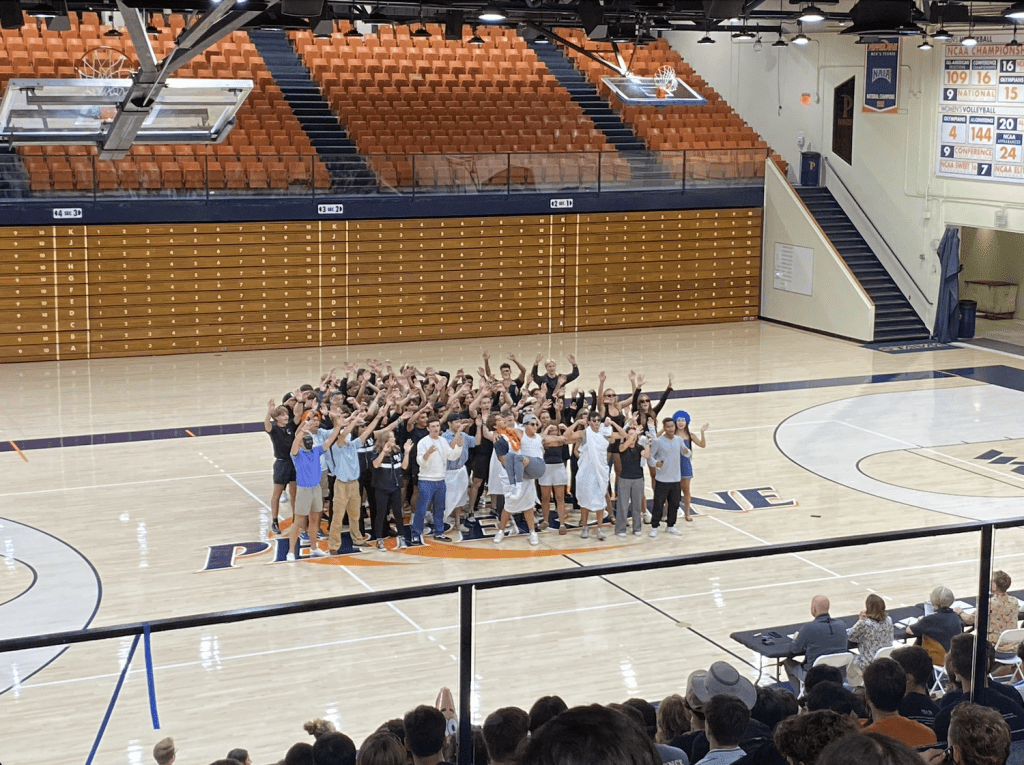 The skit by Krown Phi Alpha, Eden, Fifield and Shafer houses in Firestone Fieldhouse on Aug. 17, tells the story of the statues on campus. Students celebrated the return of the "Dolores" statue and her permanent move to the Malibu campus in 2012.