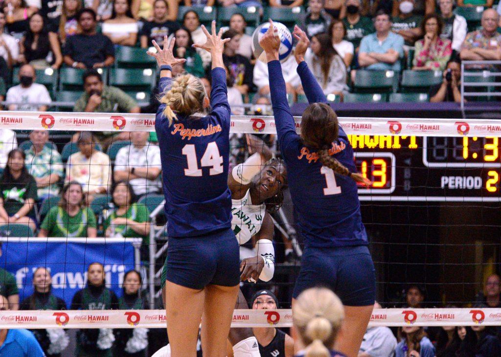 Junior middle Kenadie Patterson (left) and senior outside hitter Grace Chillingworth (right) jump for a block against the Hawaii Rainbows on Sept. 6 at SimpliFi Arena at Stan Sheriff. Patterson had eight blocks and Chillingworth had 20 kills to defeat the Rainbows at their home court.