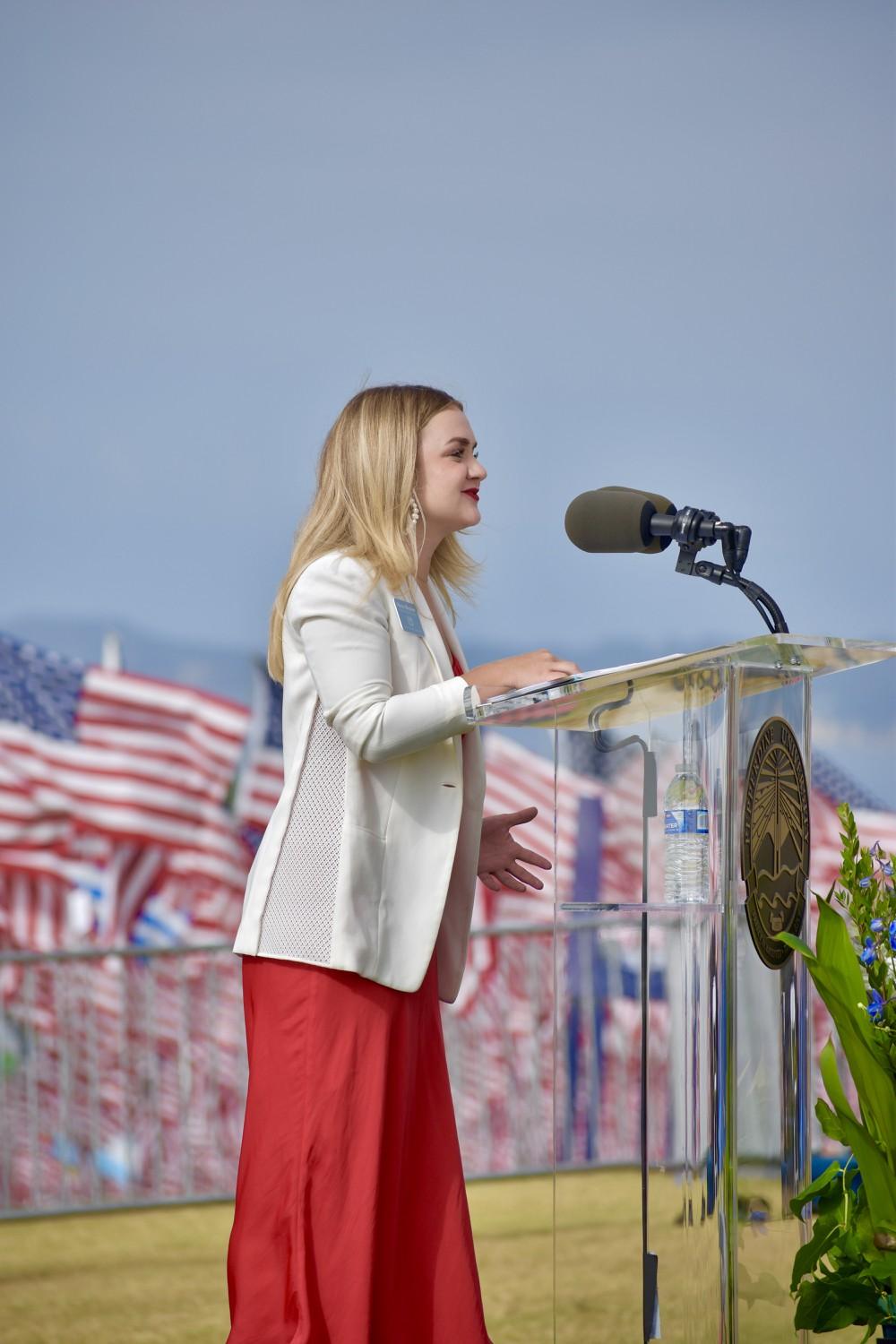 Myers Mentzer, president of the Student Government Association speaks at the 9/11 Waves of Flags memorial on Sept. 11 at Alumni Park. Mentzer read from II Corinthians 5.