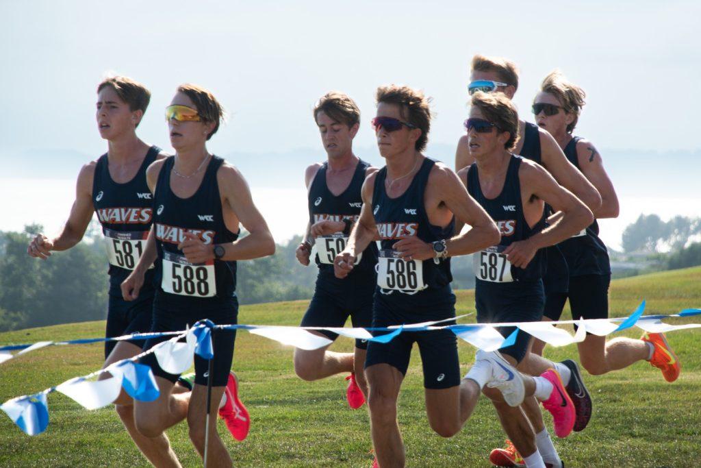 A group of Men's Cross Country runners competing in the Waves Invitational on Aug. 30, at Alumni Park. The men's side finished fourth while the women's side finished third. Photos by Perse Klopp