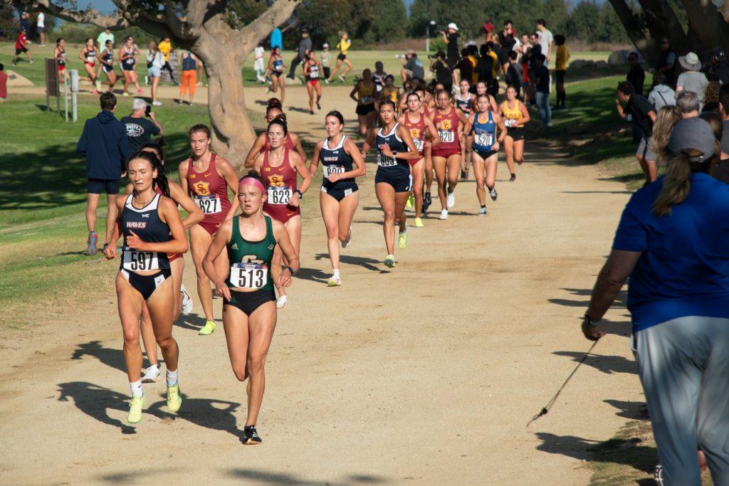 Members of Women's Cross Country as they competed in a 4k race during the Waves Invitational on Aug 30, at Alumni Park. Women's Cross Country ran neck and neck besides competitors from USC, Long Beach, Cal Poly SLO, CSUN, CSU Bakersfield and Loyola Marymount