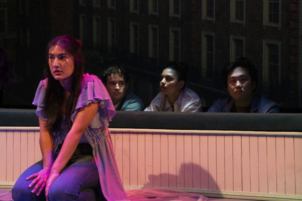 Three Lost Boys sit outside Wendy’s window during a rehearsal Sept. 22. Nibs (right) told Wendy that “truth isn’t mean” in a heated exchange at one point in the show.