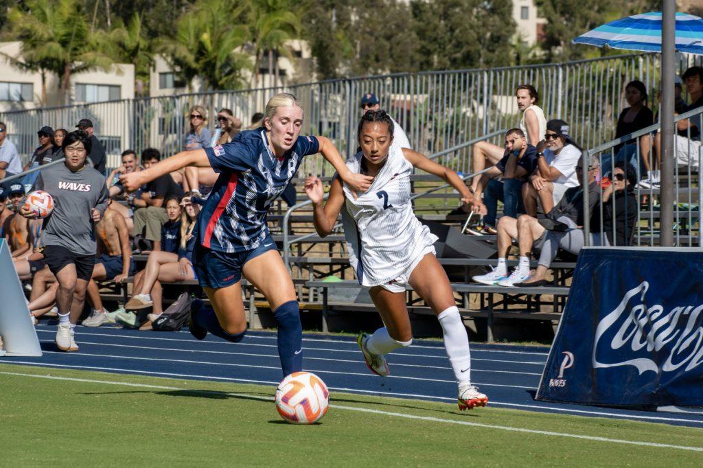 Freshman midfielder/forward Ariana Salvador fights for the ball late in the match against Arizona on Aug. 29, at Tari Frahm Rokus Field. Despite a late push, Pepperdine were unable to the find a winning goal. Photos by Colton Rubsamen.