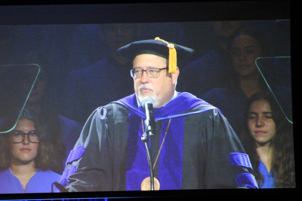 Jay Brewster speaks at Founder's Day at Firestone Fieldhouse on Sept. 18. He spoke about the importance of using your time wisely.