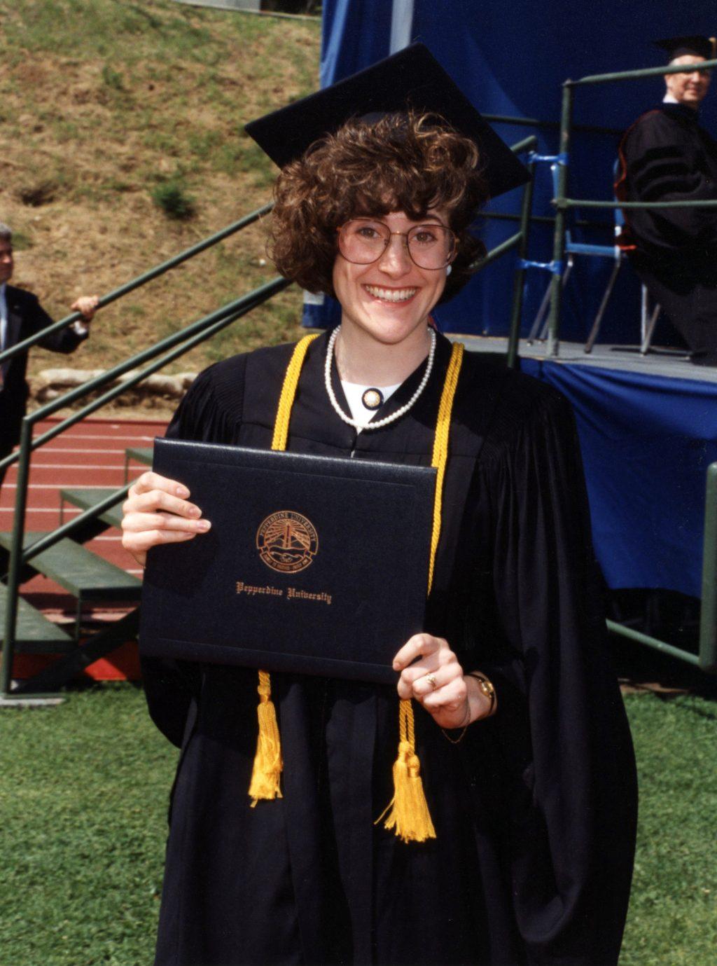 Joline stands atop the Pepperdine soccer field after receiving her diploma from Seaver College in 1992. Her biggest dream was to attend Pepperdine ever since she discovered the school during her teenage years.