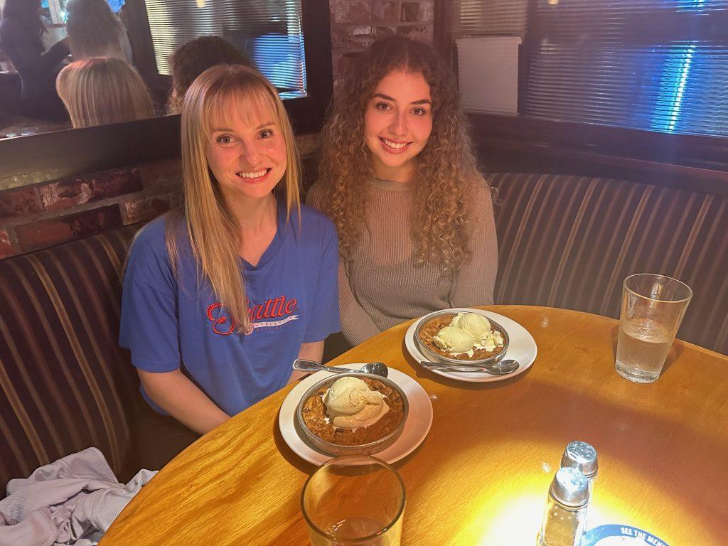 Mackenzie Dawson (left) and Diana Gordon (right) each enjoy a “Chocolate Chunk” Pizookie on Aug. 27. Dawson described Pizookie Tuesday as a “rite of passage.” Photo by Henry Adams