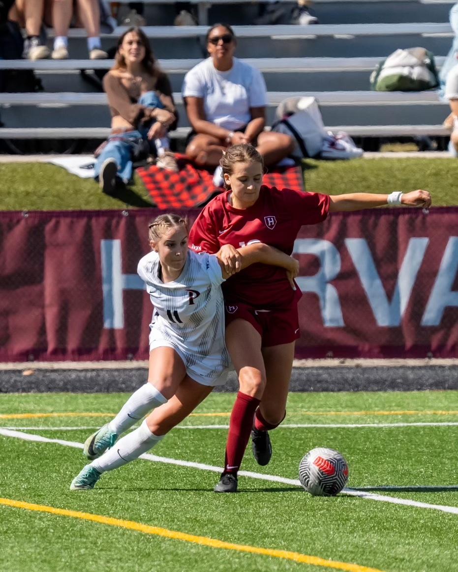 Junior midfielder/forward Tatum Wynalda fights for possession against Harvard on Sept. 8 at Jordan Field. Wynalda achieved All-WCC second-team honors during the 2023 season.