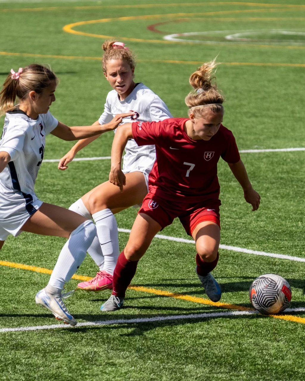 Edelman and midfielder/forward Tori Waldeck battling for possession versus Harvard on Sept. 8 at Jordan Field. Edelman scored the equalizer against the Crimson.