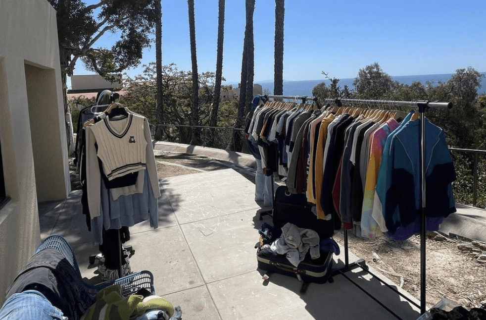 Thrift Malibu's inventory is displayed on the Peppers dorm back patio March 25, 2023. Junior Andrew Ming said Thrift Malibu makes finding unique pieces easy.