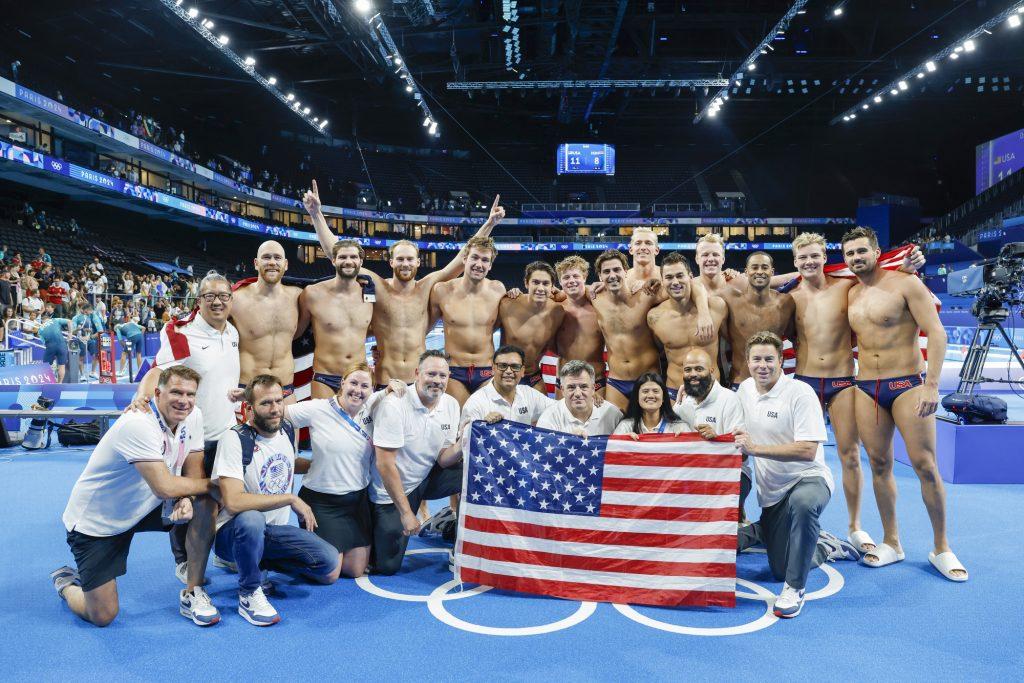 Jack Kocur, former Men's Water Polo Head Coach ('05-'11), with Team USA Men's Water Polo following their bronze medal finish at the 2024 Paris Olympics on Aug. 11. Kocur made his third Olympic Games coaching appearance, ending as a Top 3 finalist his third time around. Photo courtesy of Jack Kocur