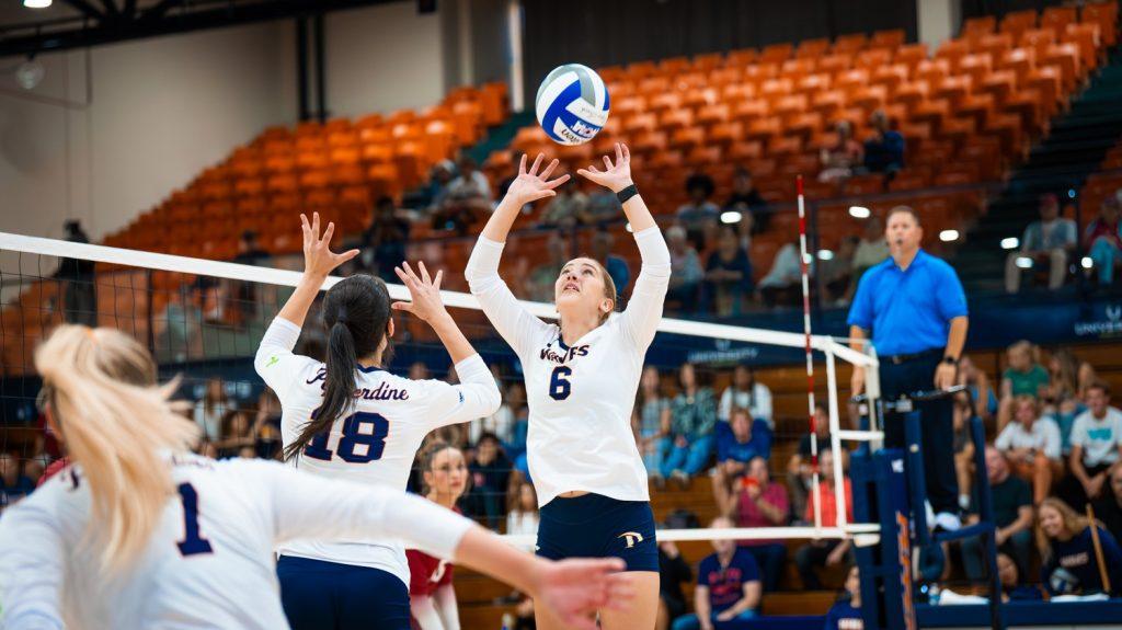 Sophomore setter Brynne McGhie jump sets for a possible kill against No. 2 Stanford on Sept. 11 at Firestone Fieldhouse. McGhie had 20 assists and said that she is working toward getting the best set to her hitter so they can swing however they need to.