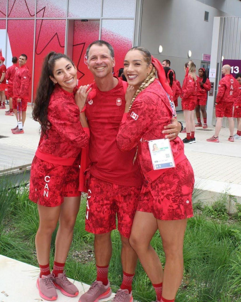 Marcio Sicoli, Women’s Beach Volleyball Head Coach, with the Canadian duo of Brandie Wilkerson and Melissa Humana-Parades at the 2024 Paris Olympics. Sicoli has helped three different national teams to Olympic medals during his journey. Photo courtesy of Marcio Sicoli