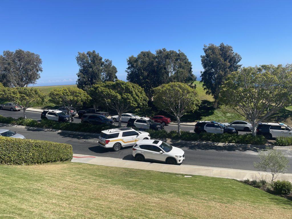 The L.A County Sheriff's Department (LASD) and Pepperdine's Department of Public Safety stop a white SUV on Banowsky Boulevard that entered campus with a BB gun pointed out the window Aug. 21. The driver and passenger were arrested by LASD. Photo by Justin Rodriguez