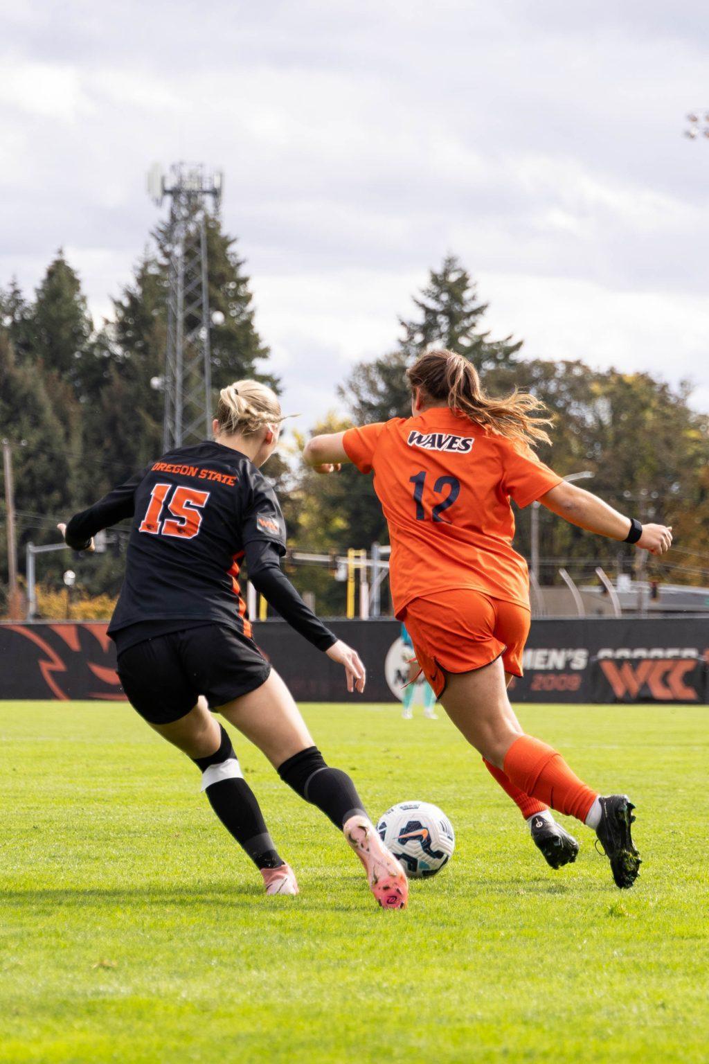 Senior midfielder Caroline Coleman attempts to box out an Oregon State forward Oct. 26 at Paul Lorenz Field. Coleman has played in 10 games this season, scoring two goals.