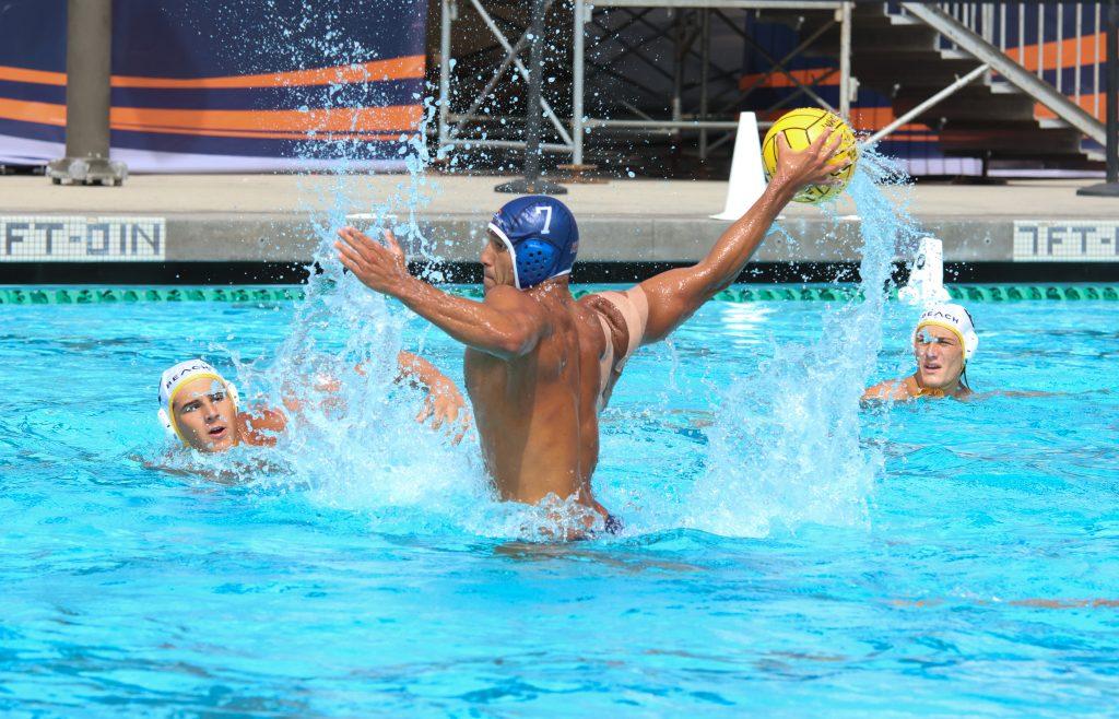 Fifth-year attacker Christian Hosea prepares a shot during his career-best day Sept. 28, at Raleigh Runnels Memorial Pool. Hosea scored seven of the Waves' 15 goals. Photos by Olivia Schneider